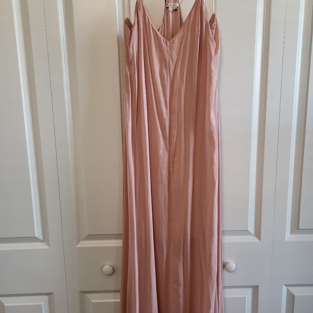 This is a crepe silk maxi dress in a soft blush pink/rose gold